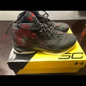 Men’s Under Armour Steph Curry basketball shoes.